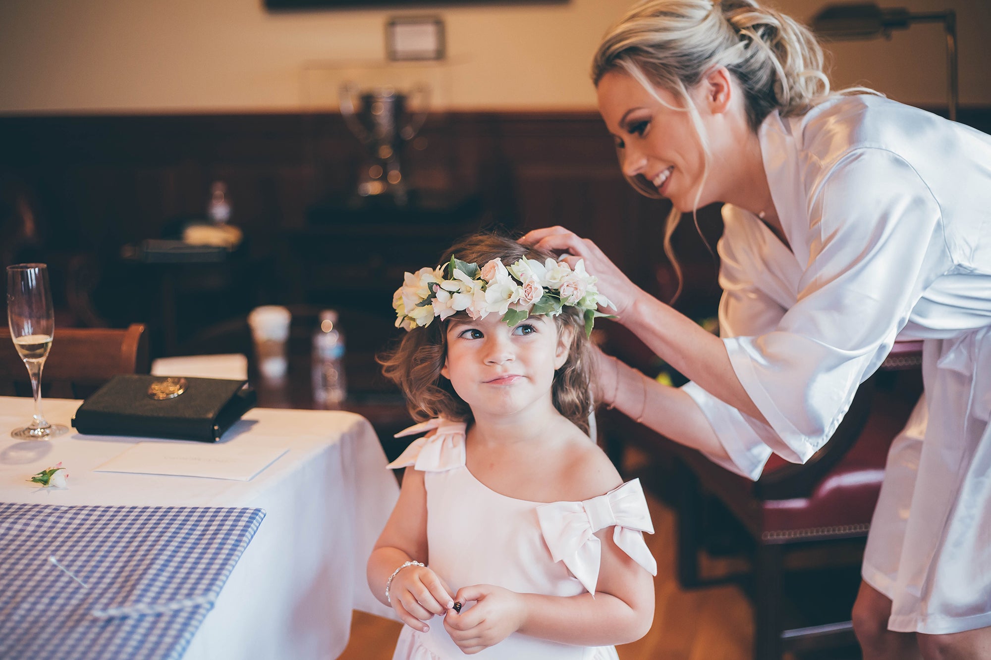 Bride helping Flower Girl with a Floral Crown